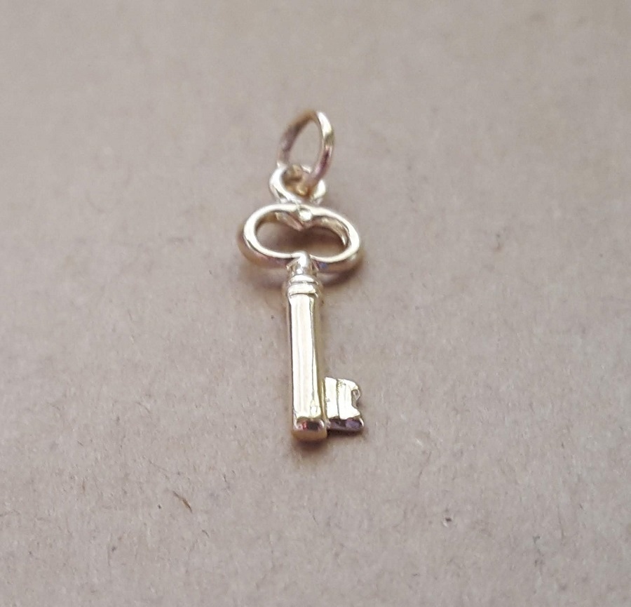Tiny key charm or pendant sterling silver or 9ct yellow, rose or white gold Australian made