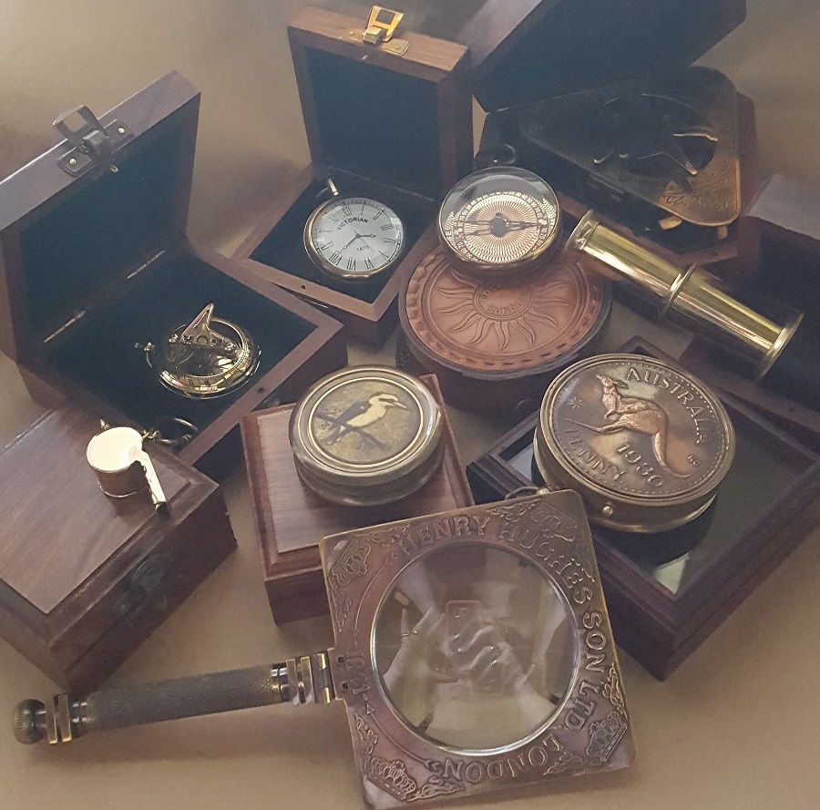vintage brass compasses